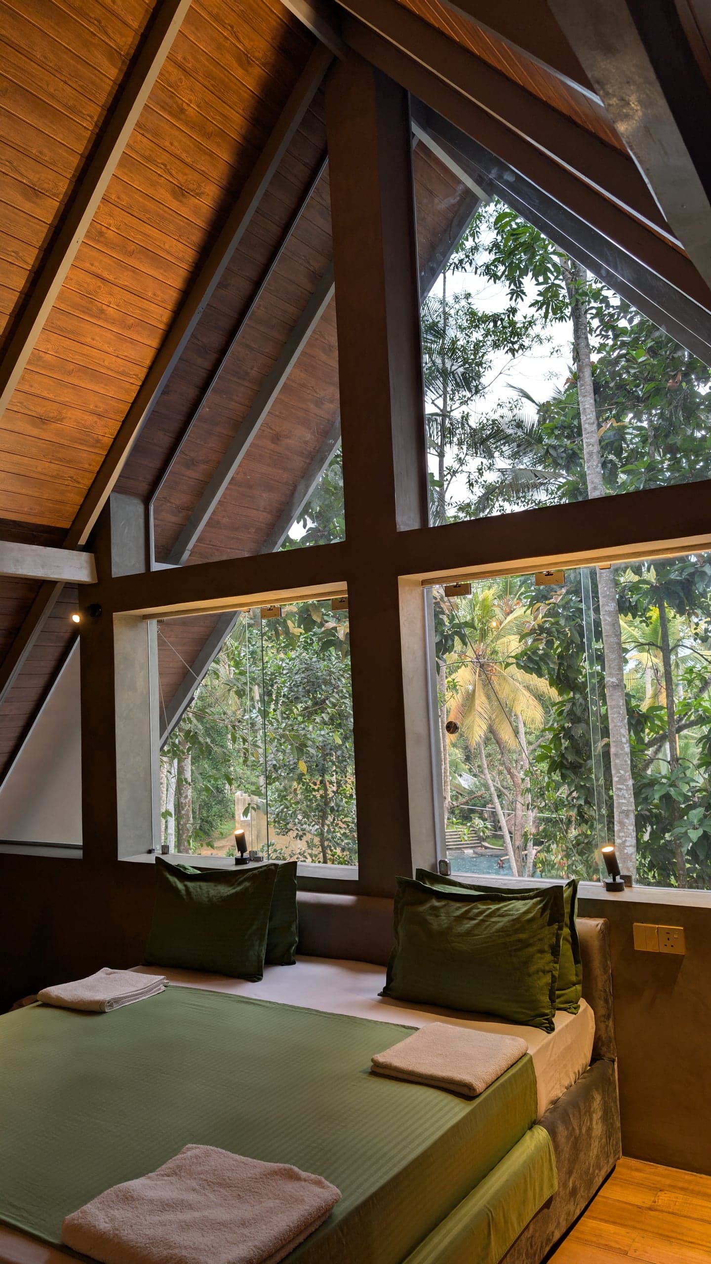 The A-frame's iconic gable window bed at Leisure Land, Galle